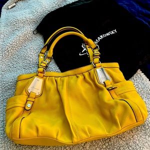 Beautiful yellow leather B Makowsky handbag. Gently used. Comes with dust cover.